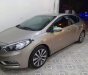 Kia K3 2015 - Cần bán Kia K3 năm sản xuất 2015, màu vàng, giá 450tr