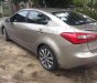 Kia K3 2015 - Cần bán Kia K3 năm sản xuất 2015, màu vàng, giá 450tr