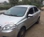 Daewoo Gentra 2010 - Cần bán gấp Daewoo Gentra đời 2010, màu bạc xe gia đình