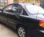 Kia Spectra 2005 - Cần bán xe cũ Kia Spectra 2005, màu đen như mới