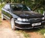 Mazda 626 2.0 MT 1999 - Cần bán Mazda 626 2.0 MT sản xuất 1999, màu đen, giá tốt