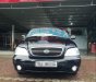 Kia Carnival  GS AT  2009 - Bán xe Kia Carnival GS AT đời 2009, màu đen, nhập khẩu 