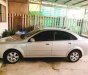 Daewoo Lacetti   2004 - Bán Daewoo Lacetti năm 2004, màu bạc, xe gia đình 