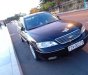 Ford Mondeo 2003 - Bán ô tô Ford Mondeo đời 2003, màu đen, xe nhập xe gia đình