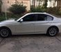 BMW 3 Series  320i  2012 - Cần bán lại xe BMW 320i sản xuất năm 2012, màu trắng, nhập khẩu nguyên chiếc