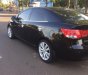 Kia Forte 2010 - Cần bán Kia Forte 2010, màu đen xe gia đình