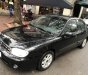 Kia Spectra   2004 - Bán xe Kia Spectra đời 2004, màu đen, số sàn, 135 triệu