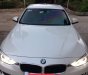 BMW 3 Series  320i  2012 - Cần bán lại xe BMW 320i sản xuất năm 2012, màu trắng, nhập khẩu nguyên chiếc