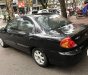 Kia Spectra   2004 - Bán xe Kia Spectra đời 2004, màu đen, số sàn, 135 triệu