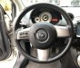 Mazda 2   2012 - Cần bán Mazda 2 2012, màu bạc xe gia đình