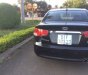 Kia Forte 2010 - Cần bán Kia Forte 2010, màu đen xe gia đình