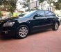 Toyota Camry 2.4G 2010 - Bán Toyota Camry 2.4G năm 2010, màu đen