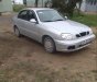 Daewoo Lanos 2004 - Cần bán Daewoo Lanos năm 2004, màu bạc