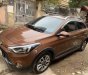 Hyundai i20 Active 2015 - Cần bán lại xe Hyundai i20 Active sản xuất năm 2015, màu nâu, nhập khẩu chính chủ, 550tr