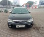 Ford Laser 2004 - Cần bán gấp Ford Laser sản xuất 2004, màu đen xe gia đình, giá chỉ 160 triệu