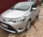 Toyota Vios 1.5E 2014 - Bán Toyota Vios 1.5E đời 2014, màu bạc như mới