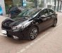 Kia Cerato 1.6 AT  2016 - Bán Kia Cerato 1.6 AT năm sản xuất 2016, màu đen, giá 580tr