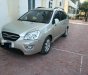 Kia Carens LX 1.6 MT 2010 - Gia đình bán gấp Kia Carens LX 1.6 MT năm 2010, màu vàng