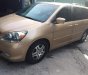 Honda Odyssey 2005 - Cần bán lại xe Honda Odyssey đời 2005, màu vàng xe gia đình giá cạnh tranh