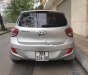 Hyundai Grand i10 1.0MT 2015 - Cần bán lại xe Hyundai Grand i10 1.0MT đời 2015, màu bạc, xe còn mới và nguyên bản toàn bộ