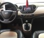 Hyundai Grand i10 1.0MT 2015 - Cần bán lại xe Hyundai Grand i10 1.0MT đời 2015, màu bạc, xe còn mới và nguyên bản toàn bộ