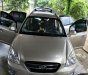 Kia Carens LX 1.6 MT 2010 - Gia đình bán gấp Kia Carens LX 1.6 MT năm 2010, màu vàng