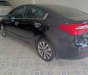 Kia K3 2015 - Gia đình bán xe Kia K3 sản xuất 2015, màu đen