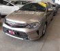 Toyota Camry 2.0E 2016 - Cần bán Toyota Camry 2.0E sản xuất năm 2016, màu vàng số tự động, giá chỉ 950 triệu