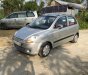 Chevrolet Spark   2010 - Gia đình bán xe Chevrolet Spark đời 2010, màu bạc, nhập khẩu