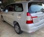 Toyota Innova E 2014 - Cần bán lại xe Toyota Innova E đời 2014, màu bạc