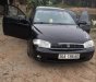 Kia Spectra  MT 2004 - Bán Kia Spectra MT đời 2004, màu đen, xe đẹp