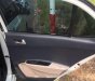 Hyundai Grand i10 2016 - Cần bán gấp Hyundai Grand i10 đời 2016, màu trắng, nhập khẩu nguyên chiếc, giá chỉ 390 triệu