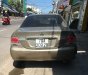 Mitsubishi Lancer   2005 - Bán xe Mitsubishi Lancer 2005, màu vàng còn mới, giá tốt