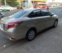 Toyota Vios E 2017 - Bán ô tô Toyota Vios E sản xuất 2017, màu vàng cát. Xe gia đình bán gấp 488 triệu