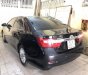 Toyota Camry 2.0E 2013 - Bán xe Toyota Camry 2.0E sản xuất 2013, màu đen