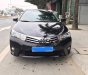 Toyota Corolla altis G 2015 - Bán ô tô Toyota Corolla altis G đời 2015, màu đen xe gia đình, giá 560tr