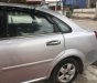 Daewoo Lacetti   2009 - Bán ô tô Daewoo Lacetti đời 2009, màu bạc xe gia đình