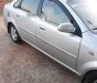 Daewoo Lacetti EX 2004 - Cần bán Daewoo Lacetti EX đời 2004, màu bạc