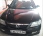 Mazda 323 2002 - Bán ô tô Mazda 323 đời 2002, màu đen