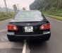 Toyota Corolla altis   J   2002 - Cần bán gấp Toyota Corolla Altis J năm sản xuất 2002, màu đen, phom dáng đẹp, tiết kiệm nhiên liệu