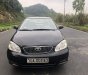 Toyota Corolla altis   J   2002 - Cần bán gấp Toyota Corolla Altis J năm sản xuất 2002, màu đen, phom dáng đẹp, tiết kiệm nhiên liệu