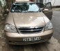 Chevrolet Lacetti 1.6 2011 - Cần bán xe Chevrolet Lacetti 1.6 đời 2011, màu vàng như mới, 210tr