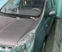 Nissan Grand livina   2010 - Bán ô tô Nissan Grand livina sản xuất năm 2010, màu xám 