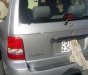 Kia Carnival 2.5 MT 2006 - Cần bán gấp xe Kia Carnival 7 chỗ, Sx 2006, số tay, máy xăng, màu bạ, nội thất màu ghi, đã đi 104000 km