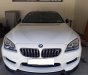 BMW M6 Gran Coupe 2015 - Cần bán BMW M6 Gran Coupe 4.4L V8(560Hp) - trắng, nội thất cam/đen