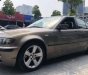 BMW 3 Series  325i  2005 - Cần bán BMW 3 Series 325i 2005, màu vàng, xe nhập