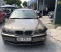 BMW 3 Series  325i  2005 - Cần bán BMW 3 Series 325i 2005, màu vàng, xe nhập