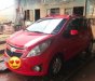 Chevrolet Spark  MT 2012 - Chính chủ bán gấp Chevrolet Spark MT đời 2012, màu đỏ, xe nhập