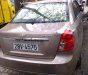 Chevrolet Lacetti   2004 - Bán Chevrolet Lacetti sản xuất 2004, màu vàng cát, giá chỉ 146 triệu