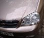 Chevrolet Lacetti   2004 - Bán Chevrolet Lacetti sản xuất 2004, màu vàng cát, giá chỉ 146 triệu